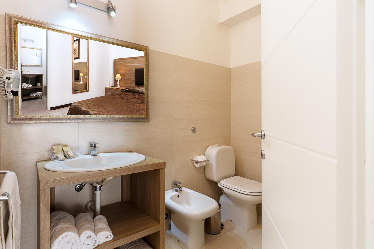 Le Residenze Del Centro Aparthotel Olbia Luaran gambar